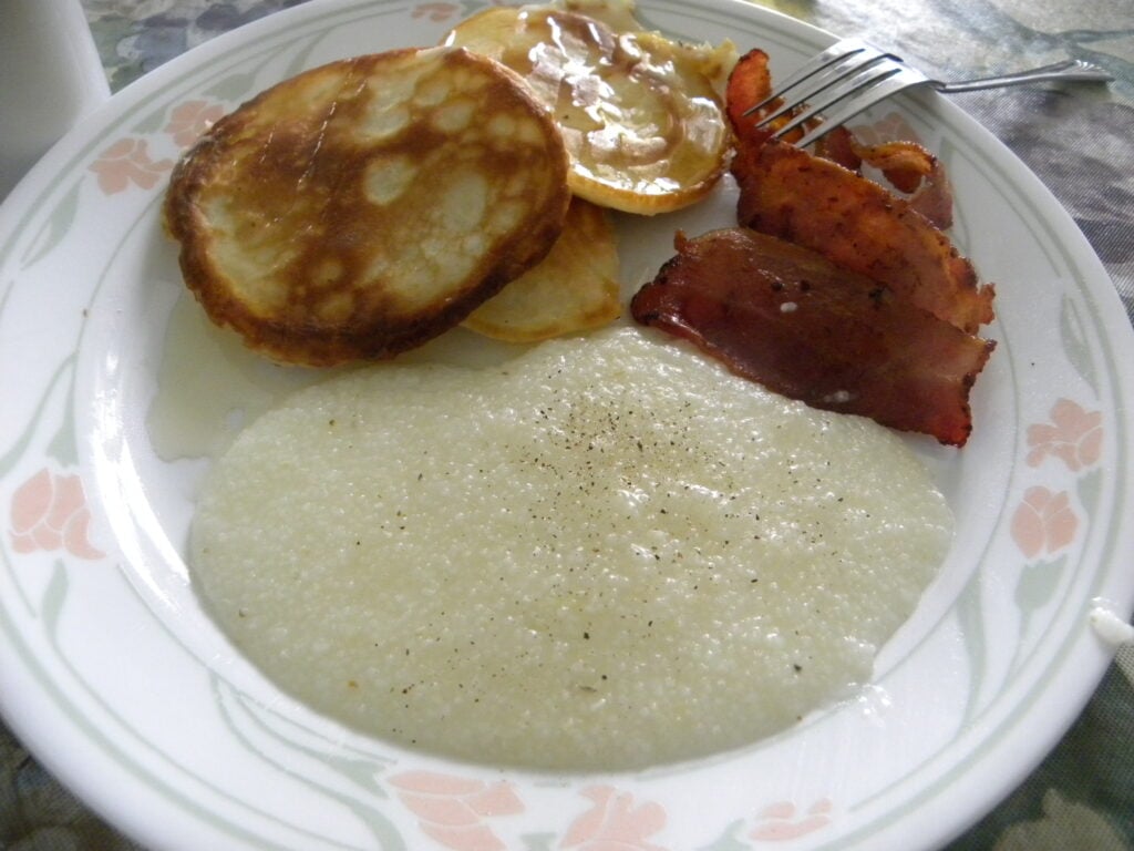 pancakes, bacon, grits pancakes, bacon, grits