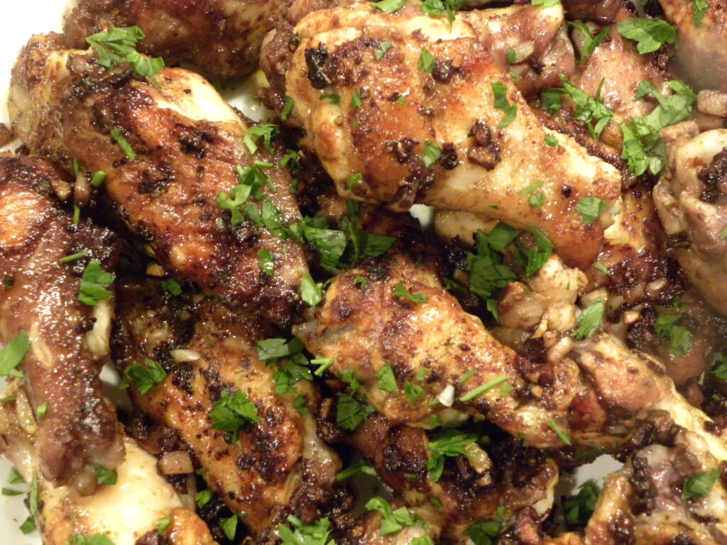 garlic-sizzled chicken wings garlic-sizzled chicken wings