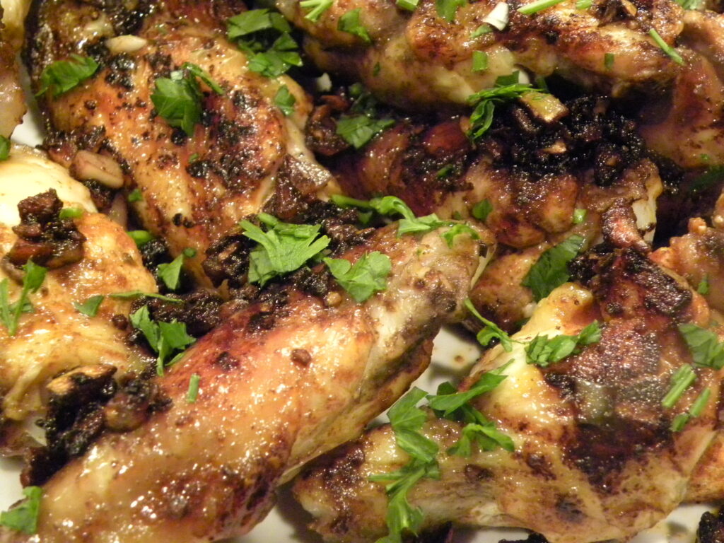 garlic-sizzled chicken wings garlic-sizzled chicken wings