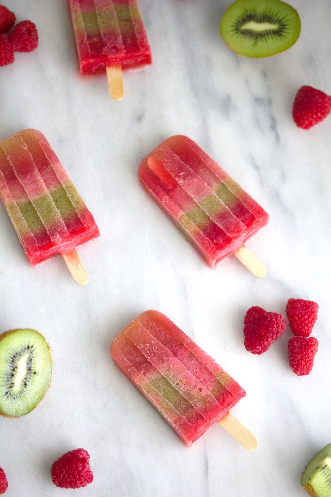 Raspberry and Kiwi Sangria Popsicles -- A summertime treat for adults only | wearenotmartha.com