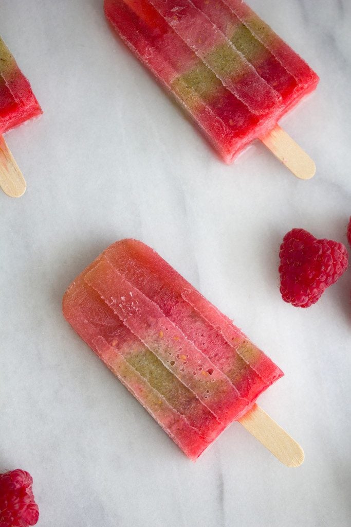 Raspberry and Kiwi Sangria Popsicles -- A summertime treat for adults only | wearenotmartha.com