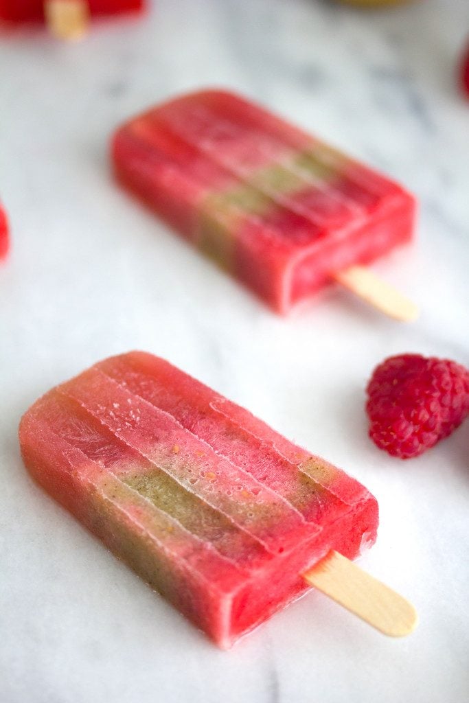 Raspberry and Kiwi Sangria Popsicles -- A summertime treat for adults only | wearenotmartha.com