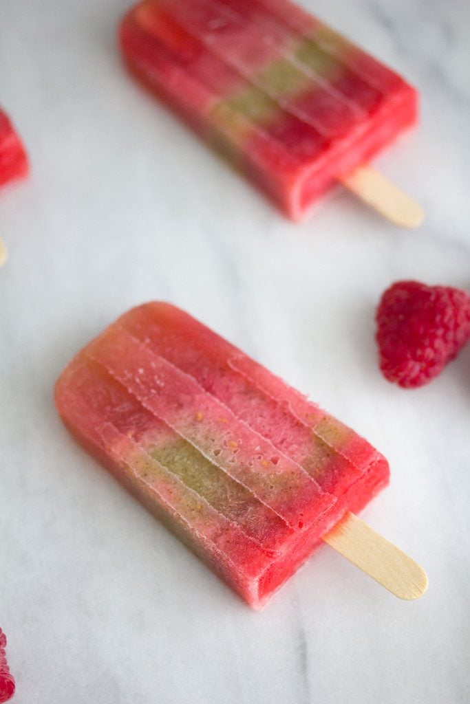 Raspberry and Kiwi Sangria Popsicles -- A summertime treat for adults only | wearenotmartha.com
